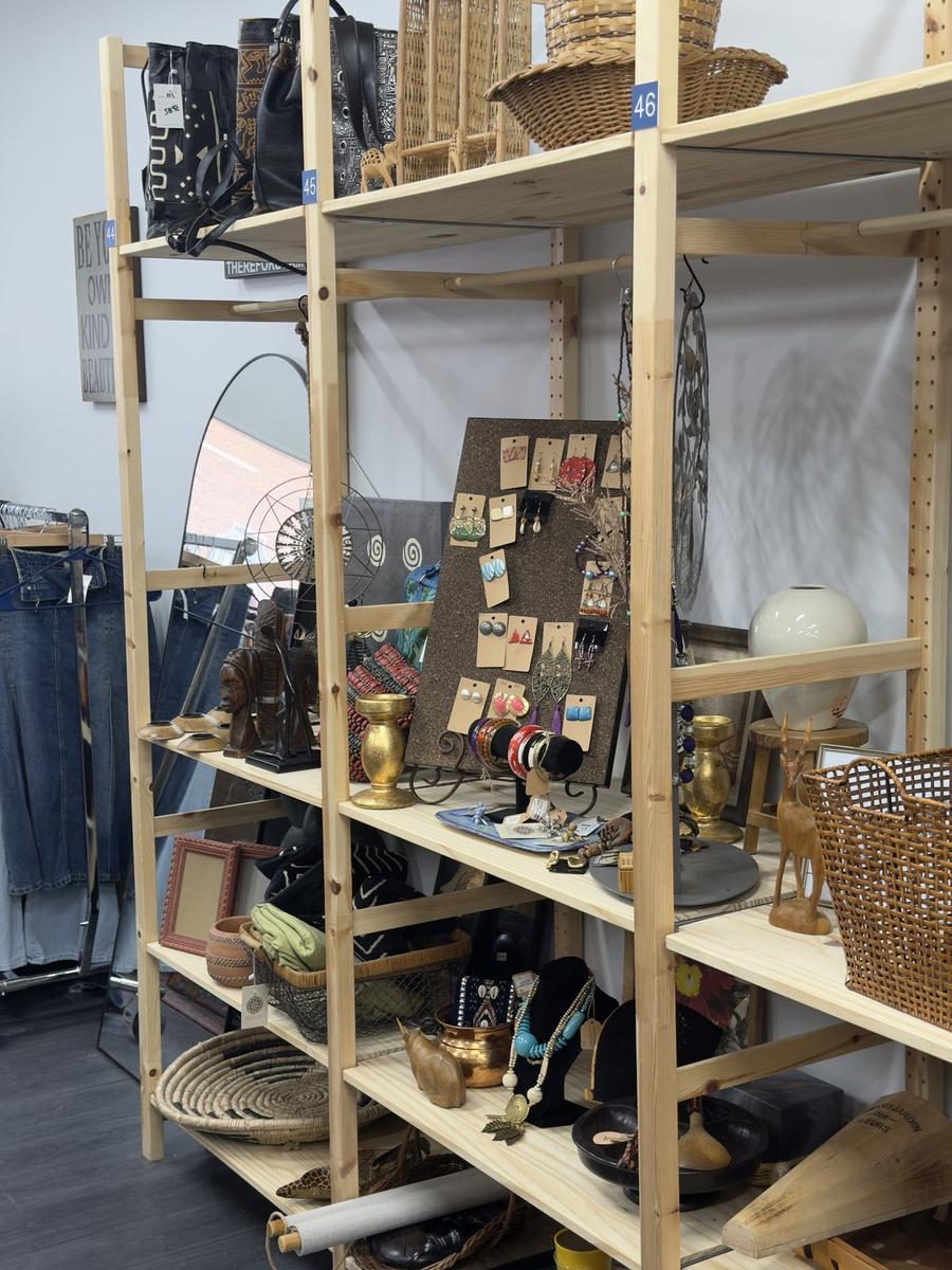 Handmade jewelry and artisan accessories on display shelves